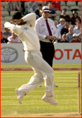 Darrell Hair watches Muttiah Muralitharan bowl, Edgbaston.