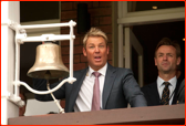 Shane Warne rings the Lord's bell.