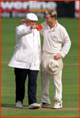 Umpire David Shepherd shows Shane Warne the 'red card'.