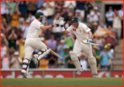 Michael Hussey (100) with Brad Haddin.